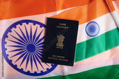 Indian passport on the national flag symbolizes identity and travel.