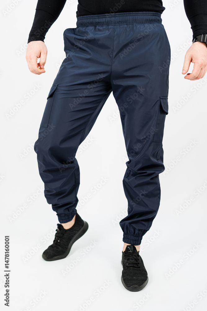 Discover the ultimate combination of style and functionality with our Stylish Mens Navy Cargo Pants. Designed with elastic cuffs, they provide comfort and flexibility for an active lifestyle