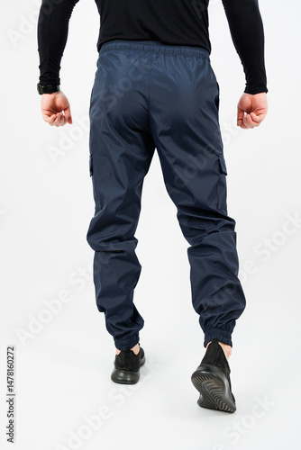 Obraz na płótnie Introducing our Mens Athletic Performance Track Pants, designed for your ultimate comfort. These lightweight, breathable pants are perfect for gym workouts, running, and casual daily wear w salonie