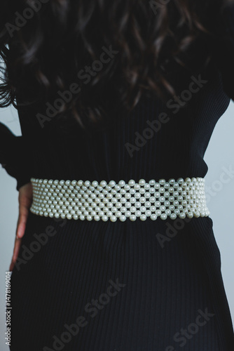 Obraz na płótnie The Elegant Pearl Belt A Stylish Accessory That Perfectly Enhances and Complements a Chic Black Dress, Making It a MustHave for Any Fashionable Womans Wardrobe, Perfect for Various Occasions w salonie