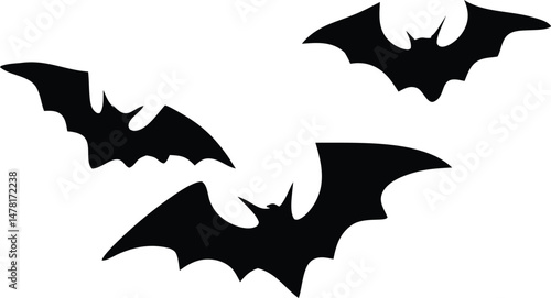 Black vector art illustration shows a set of Halloween bat silhouettes, a flying symbol of the night