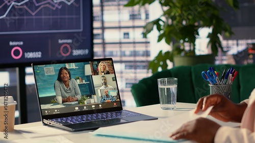 Canvas Print African american CEO meeting with the forecast affiliates on online videocall, discussing about the future of the company