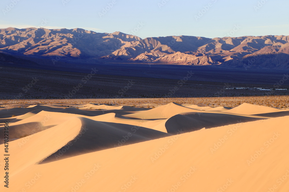 Fototapeta premium The Panamint mountains rise steeply at the edge of the Dune field in Death Valley, California