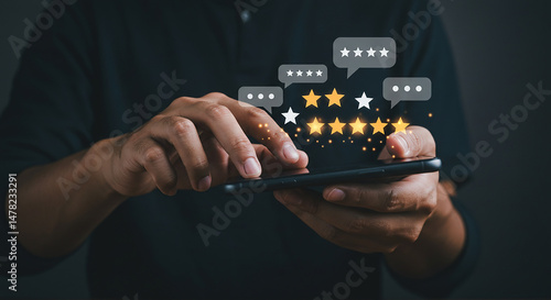 A person interacts with a smartphone displaying star ratings and speech bubbles on a dark background