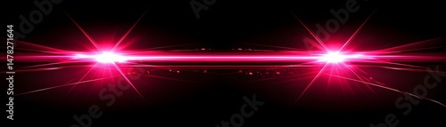 Vivid pink light effect with lens flares on a dark background.