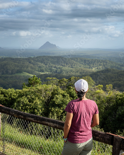 Woman enjoying mountain view from lookout point