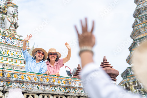 Photography Happy Asian senior woman tourist travel Bangkok city, Thailand on summer holiday vacation