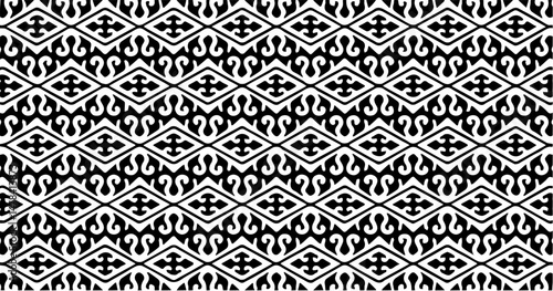 A structured tribal motif pattern in a geometric style using black shapes on a white background. Ideal for backgrounds, fashion, or digital design.