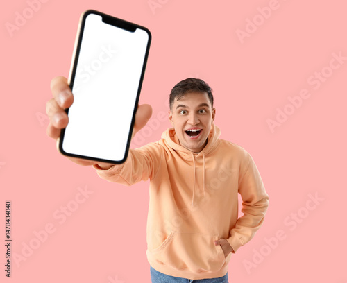 Happy young man with blank ...