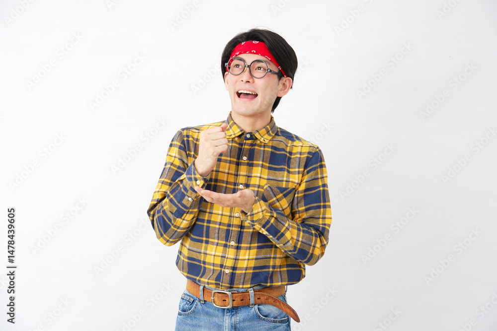 Fototapeta premium アキバ系の男性 ひらめく 白背景
