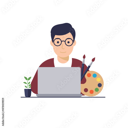 Young Designer working on laptop with palette and plant on desk. Design Work, Creative Process, Remote Work concept. Employment, Career, Technology, Arts