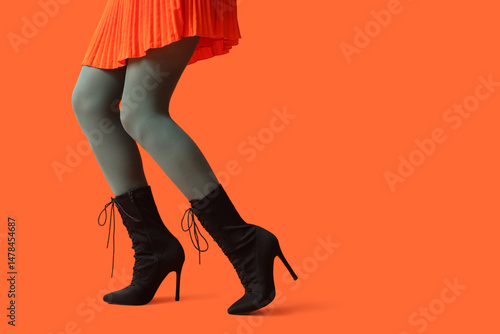 Fashionable woman's legs in...