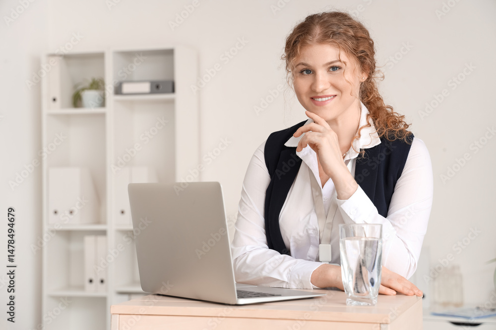 Beautiful business speaker conducting seminar in office Beautiful business speaker conducting seminar in office