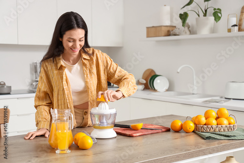 Young woman making tasty or...