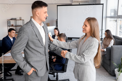 Business partners shaking h...