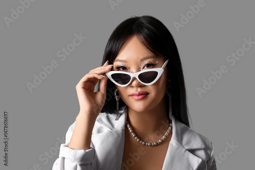 Beautiful Asian woman with ...