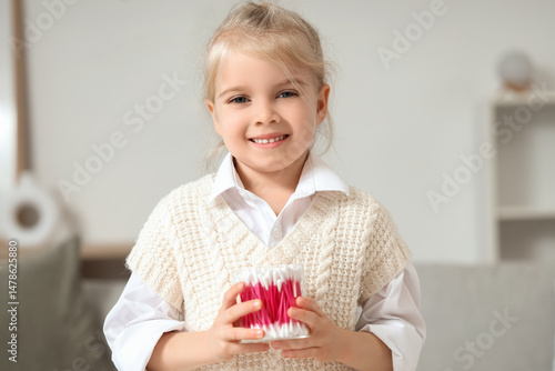 Cute little girl with cotto...