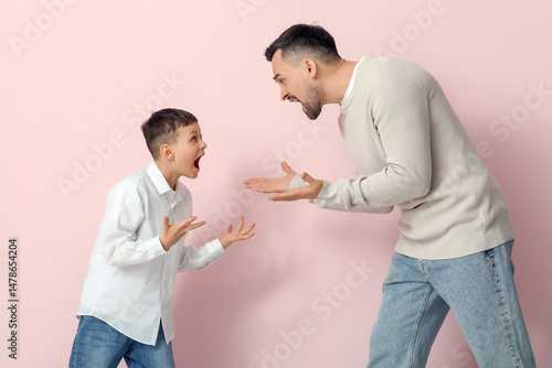 Angry father with his son s...