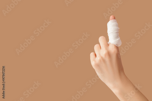 Female hand with applied ga...