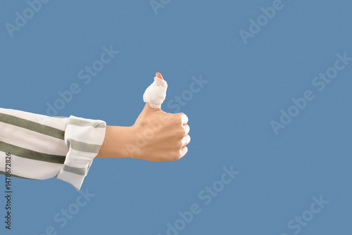 Female hand with applied ga...