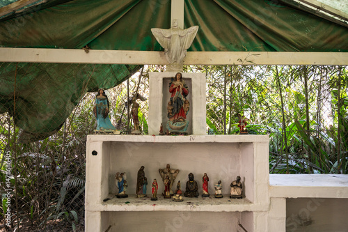 simple altar with statues of saints from Brazilian Umbanda