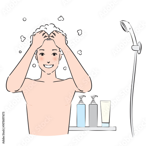シャンプーを泡だてしっかり洗髪する男性