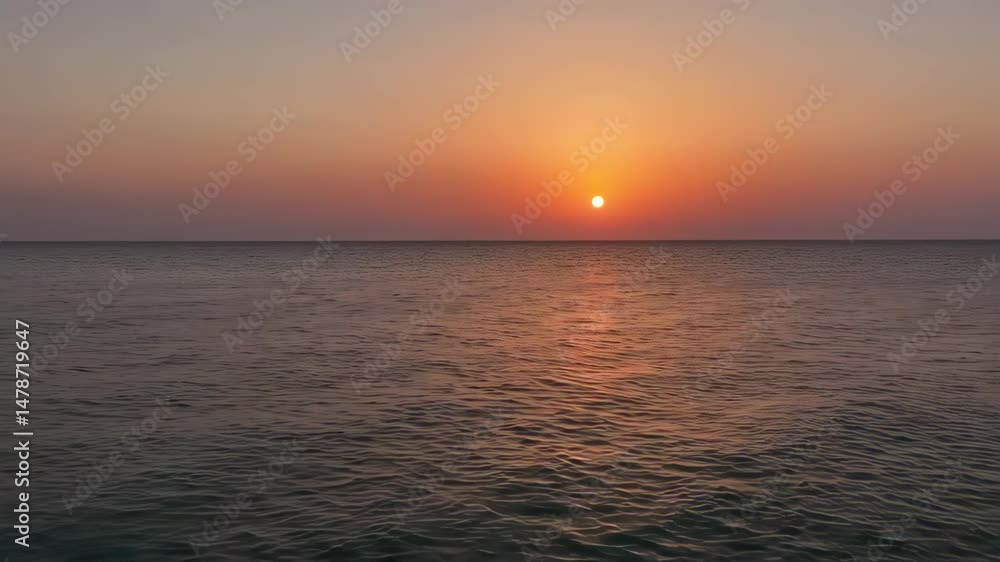 Serene Sunset over Calm Ocean: Warm Hues and Subtle Reflections Serene Sunset over Calm Ocean: Warm Hues and Subtle Reflections
