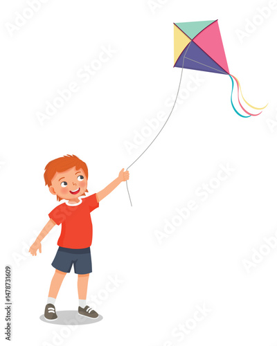 Little boy playing kite outside