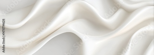 Smooth, flowing white fabric drapes in elegant folds.