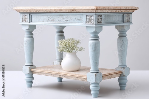 A piece of furniture with paint peeling off and joints visibly unstable