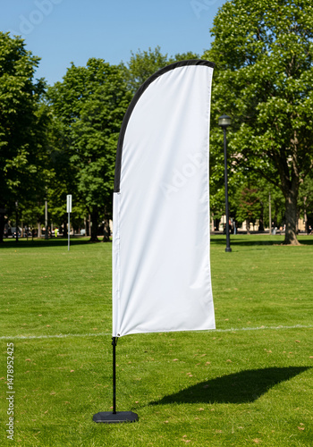 Blank White Feather Flag on Grassy Field, Ready for Custom Design