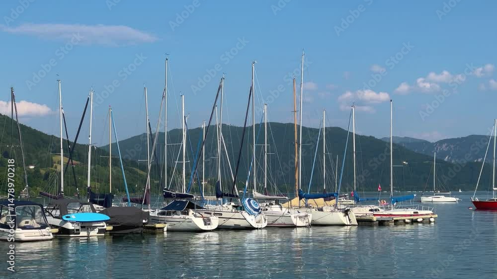 Mondsee, Upper Austria / Austria: a sunny summer day at the Alpenseebad Mondsee, a popular lakeside leisure spot in the town of Mondsee Mondsee, Upper Austria / Austria: a sunny summer day at the Alpenseebad Mondsee, a popular lakeside leisure spot in the town of Mondsee
