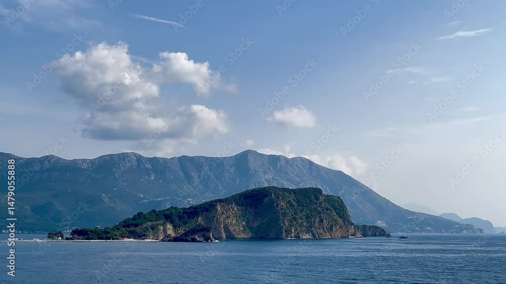 Peaceful seascape with Sveti Nikola Island and layered mountains captured on a clear afternoon
Peaceful seascape with Sveti Nikola Island and layered mountains captured on a clear afternoon