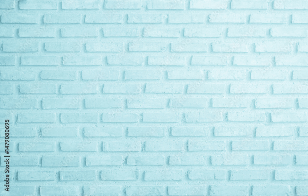 Obraz premium Brick wall painted with pale blue paint pastel calm tone texture background. Brickwork and stonework flooring interior rock old pattern clean concrete grid uneven bricks design stack backdrop.