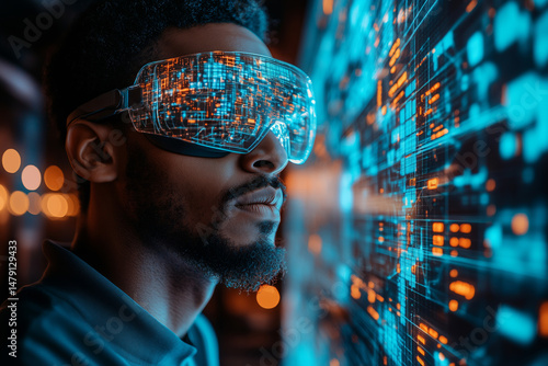 a technician in augmented reality glasses examining a 3D projection