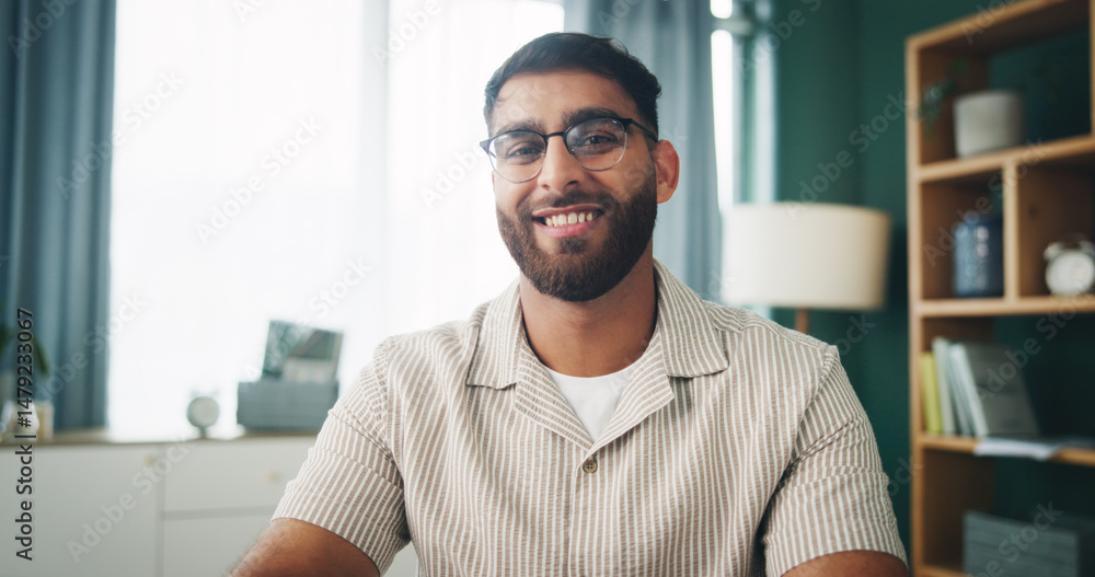 Portrait, glasses and happy man in apartment for relax, peace or calm on weekend break in home. Smile, living room and male person with spectacles for vision, resting and chill with confidence in UAE Portrait, glasses and happy man in apartment for relax, peace or calm on weekend break in home. Smile, living room and male person with spectacles for vision, resting and chill with confidence in UAE