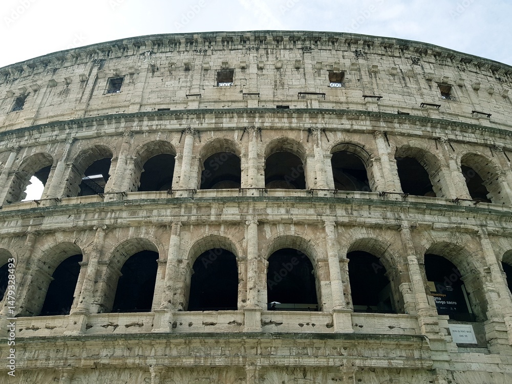 Fototapeta premium Colosseum in Rome, Italy. Roman Coliseum is one of the main tourist attractions of Rome.