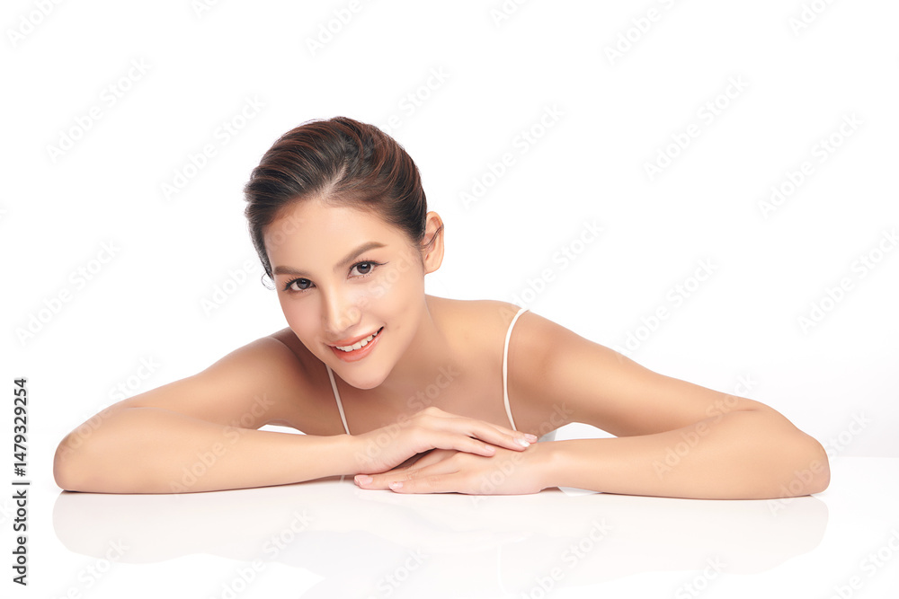 A beautiful young Asian woman with clean, fresh skin against a white background. Skincare, facial treatment, cosmetology, beauty, and spa. An elegant portrait of an Asian woman. A beautiful young Asian woman with clean, fresh skin against a white background. Skincare, facial treatment, cosmetology, beauty, and spa. An elegant portrait of an Asian woman.