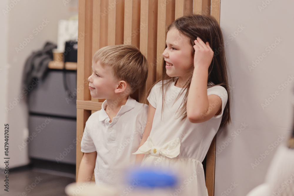 A boy and a girl at a children birthday party A boy and a girl at a children birthday party