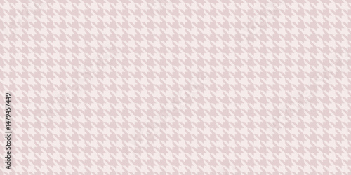 Elegant pale pink houndstooth pattern.  Perfect for fashion, textile, and website backgrounds. This subtle yet sophisticated design offers a timeless aesthetic, conveying refinement and style.