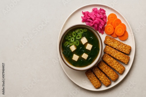 Wallpaper Mural Gut friendly foods. A vibrant, healthy plate featuring soup, tempeh, and fresh vegetables. Torontodigital.ca