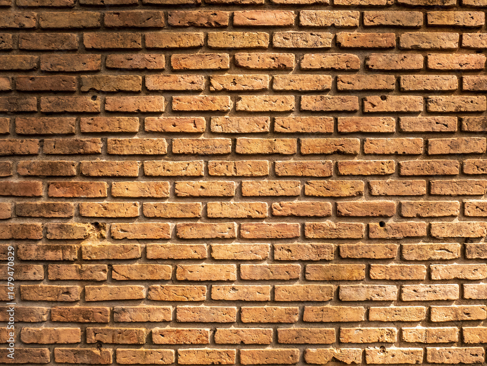 Fototapeta premium old red brick wall texture background crack on surface with light and shadow