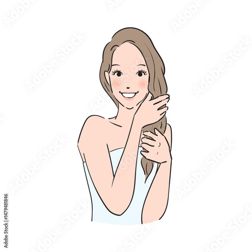 丁寧にヘアケアをするロングヘアの女性