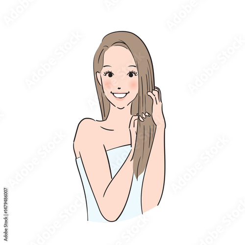 丁寧にヘアケアをするロングヘアの女性
