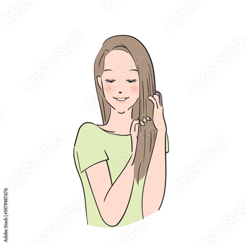 丁寧にヘアケアをするロングヘアの女性