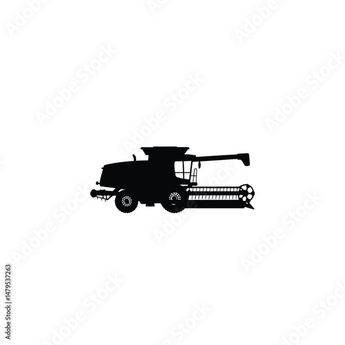 Combine harvester silhouette on white background