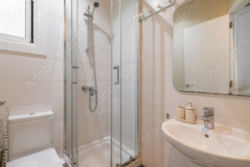 Wallpaper Mural Compact bathroom interior with white tile walls glass shower enclosure and minimal decor Torontodigital.ca