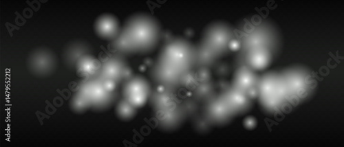 White glowing dots with smooth gradients and bokeh effect on dark transparent background. Abstract fire glow or warm light blur.