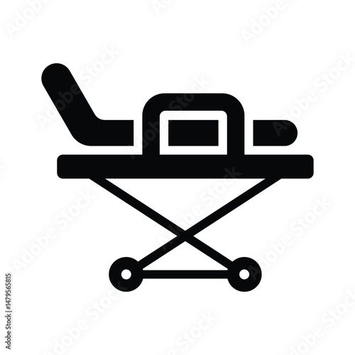 A glyph style icon showing hospital stretcher