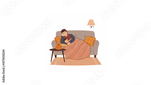 Dad asleep on couch with son during cozy Thanksgiving afternoon
